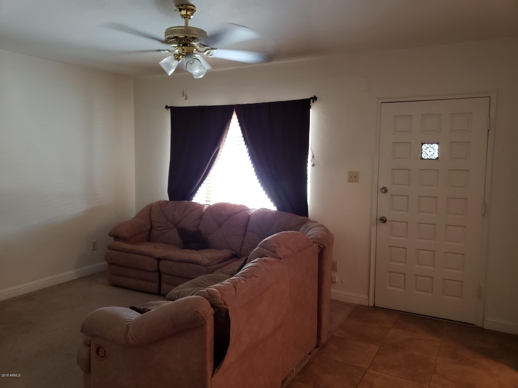 334 West Piedmont Road Phoenix, AZ 85041 - Photo 7 of 36 Living Room
