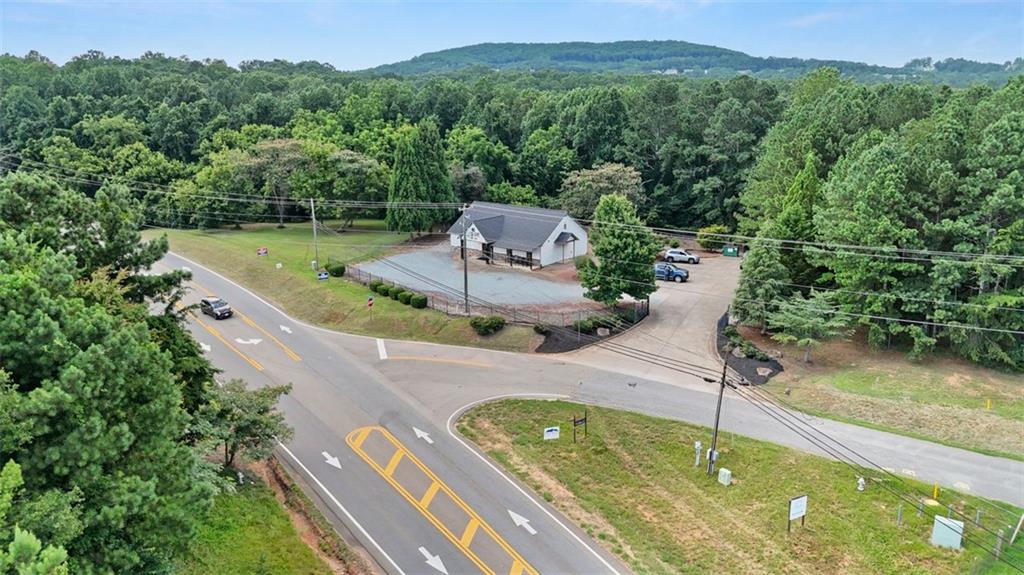 100 Pearidge Road Canton, GA 30114 - Photo 11 of 16 a view of a lake in middle of the forest