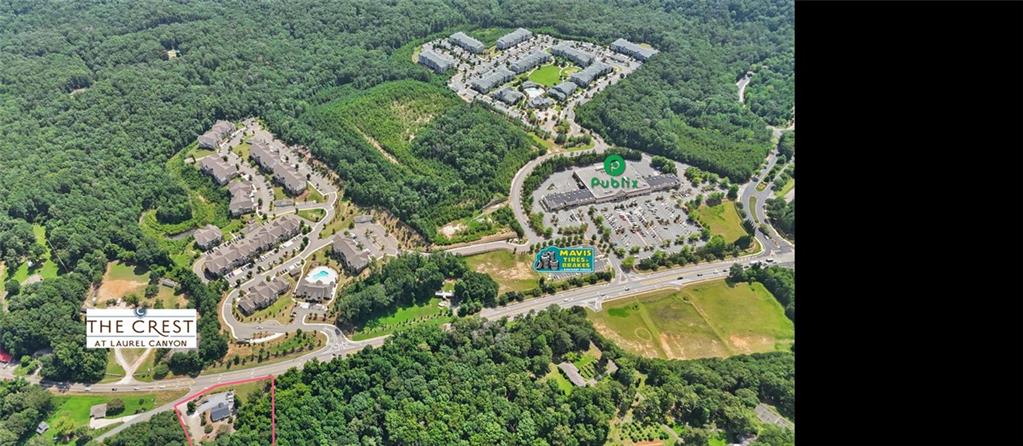 100 Pearidge Road Canton, GA 30114 - Photo 7 of 16 an aerial view of a house with a yard and garden
