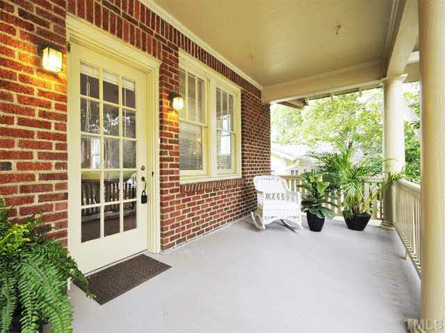 1821 White Oak Road Raleigh, NC 27608 - Photo 1 of 25 a front view of a building with potted plants