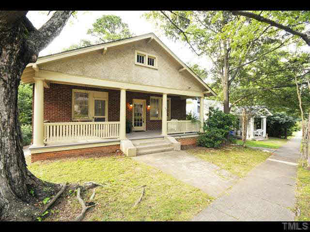 1821 White Oak Road Raleigh, NC 27608 - Photo 15 of 25 a view of a house with a yard and sitting area