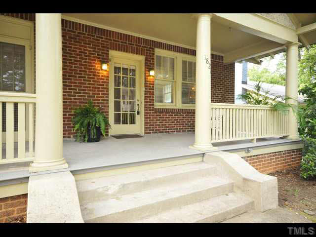 1821 White Oak Road Raleigh, NC 27608 - Photo 16 of 25 a front view of a house with a garden