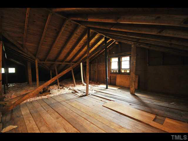 1821 White Oak Road Raleigh, NC 27608 - Photo 24 of 25 a view of an empty room with wooden floor