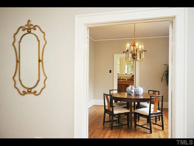 1821 White Oak Road Raleigh, NC 27608 - Photo 5 of 25 a dining room with furniture and chandelier