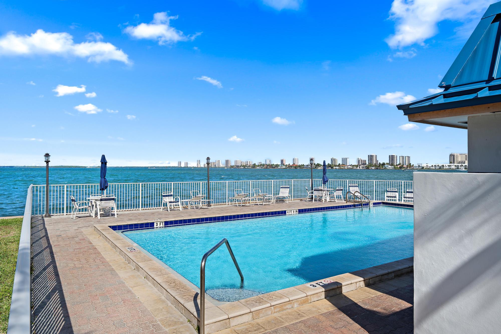 400 Wilma Circle, Unit 309 Riviera Beach, FL 33404 - Photo 17 of 18 Community Pool