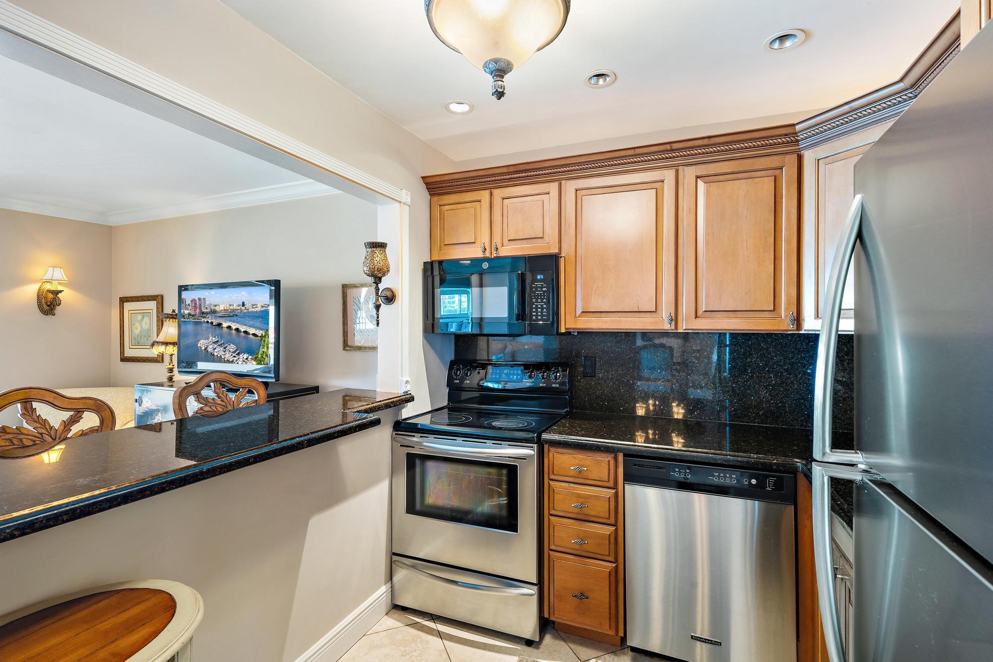 400 Wilma Circle, Unit 309 Riviera Beach, FL 33404 - Photo 6 of 18 Kitchen