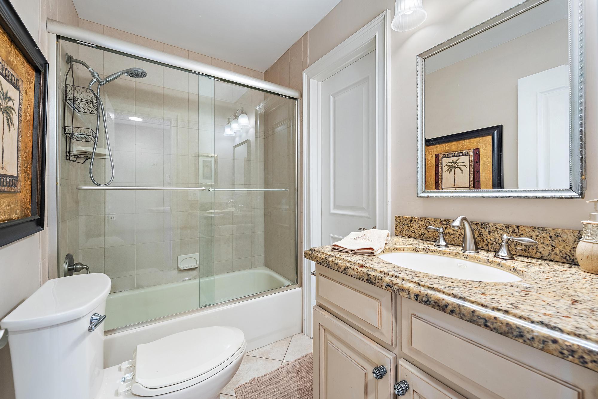 400 Wilma Circle, Unit 309 Riviera Beach, FL 33404 - Photo 9 of 18 Primary Bath