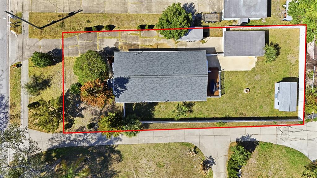 231 North Ridgewood Avenue Ormond Beach, FL 32174 - Photo 52 of 52 an aerial view of a house with a yard