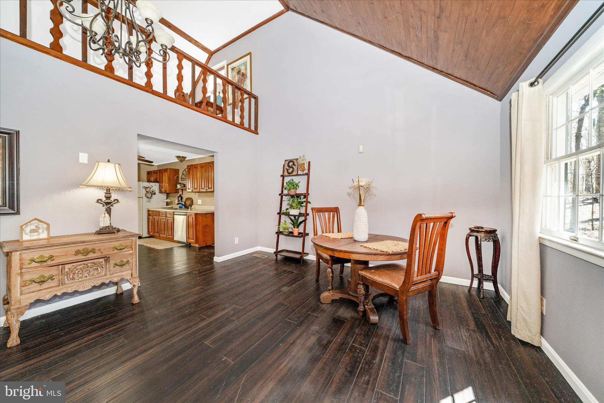 15211 Avery Road Rockville, MD 20855 - Photo 11 of 60 a view of a dining room with furniture and wooden floor