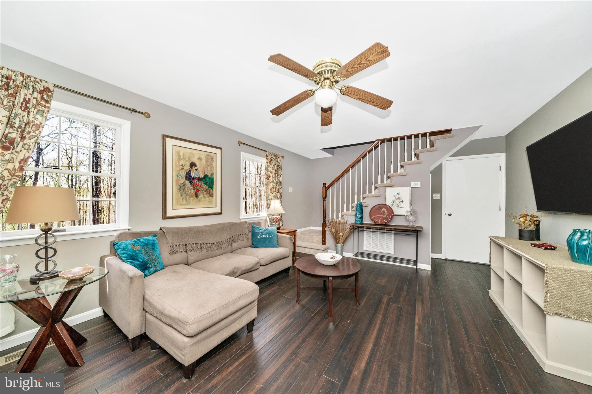 15211 Avery Road Rockville, MD 20855 - Photo 12 of 60 a living room with furniture and a flat screen tv