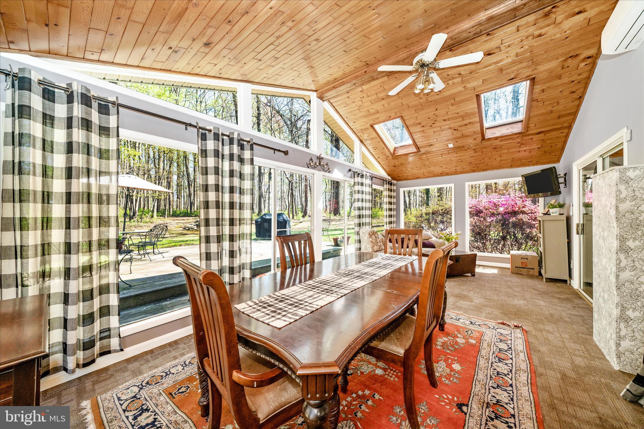 15211 Avery Road Rockville, MD 20855 - Photo 21 of 60 a view of a dining room with furniture one side kitchen view and wooden floor