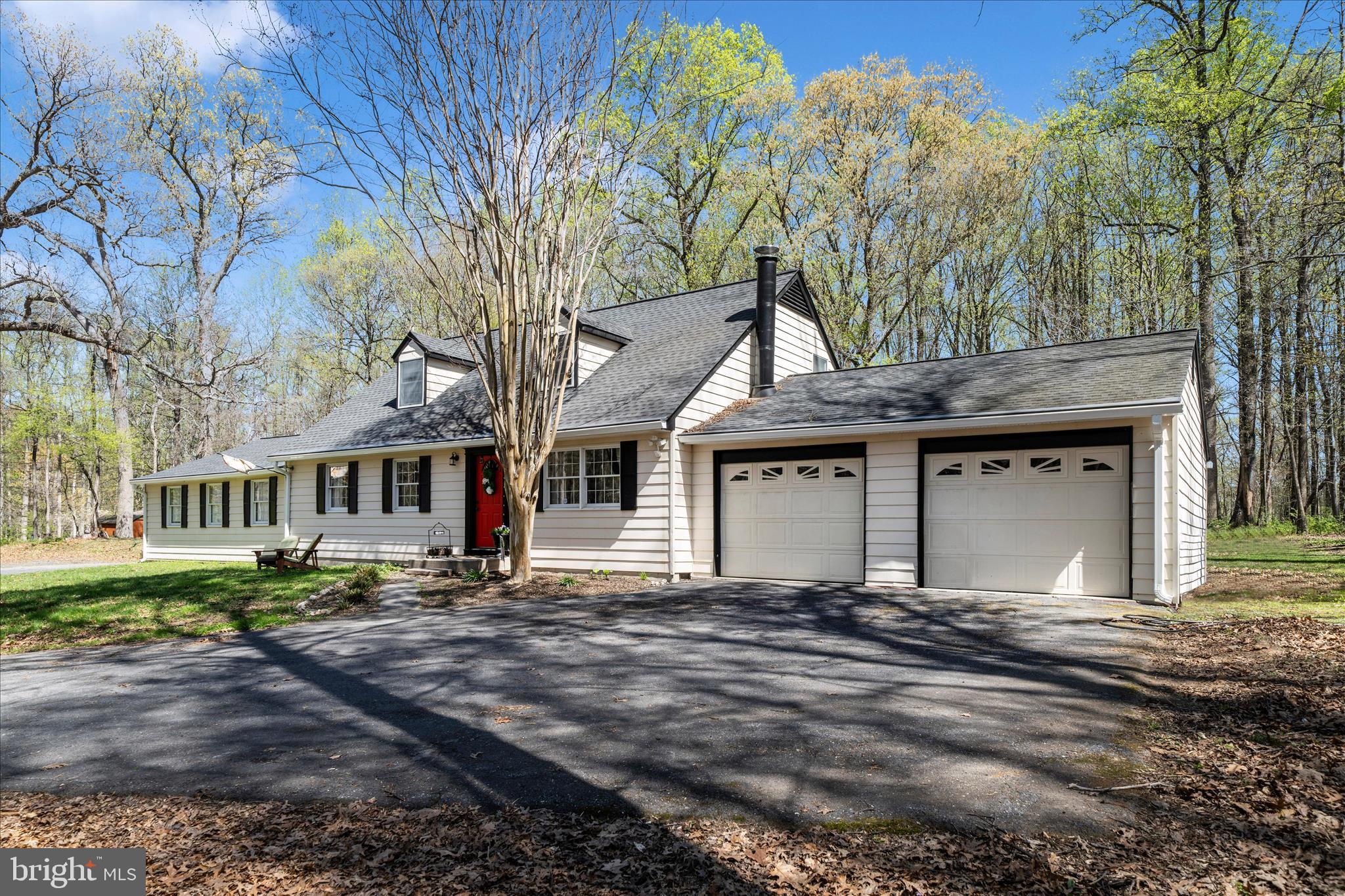 15211 Avery Road Rockville, MD 20855 - Photo 3 of 60 a front view of a house with a yard