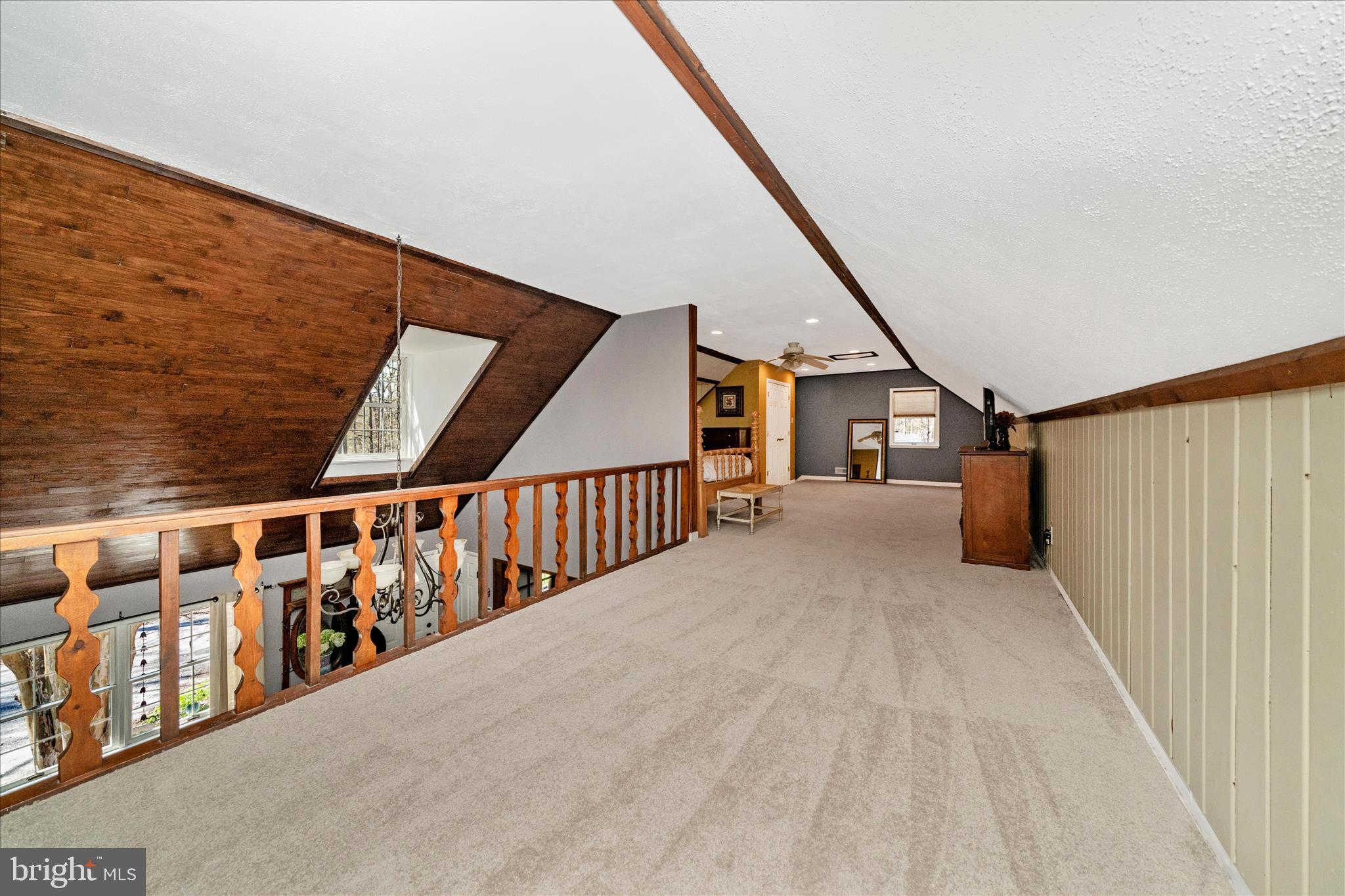 15211 Avery Road Rockville, MD 20855 - Photo 40 of 60 a view of staircase with lots of wooden floor and windows