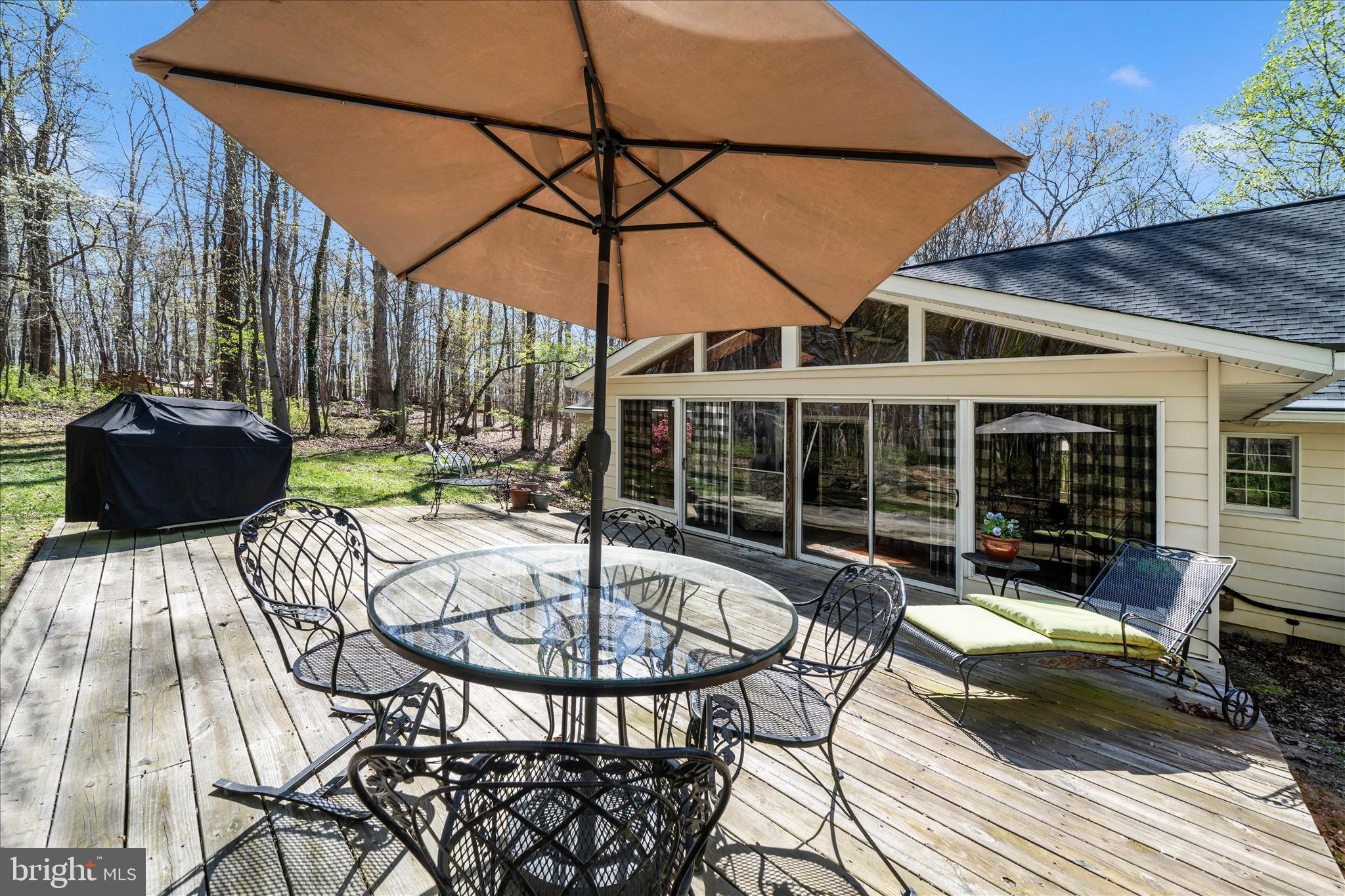 15211 Avery Road Rockville, MD 20855 - Photo 47 of 60 a view of a house with sitting area and furniture
