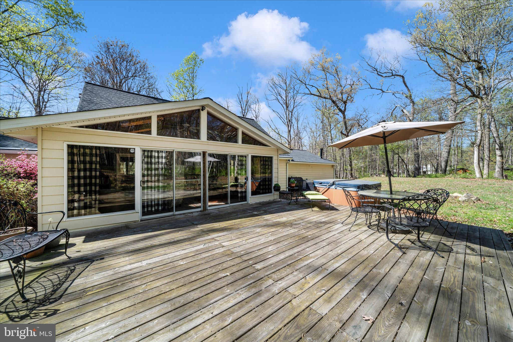 15211 Avery Road Rockville, MD 20855 - Photo 48 of 60 a view of a house with backyard porch and sitting area