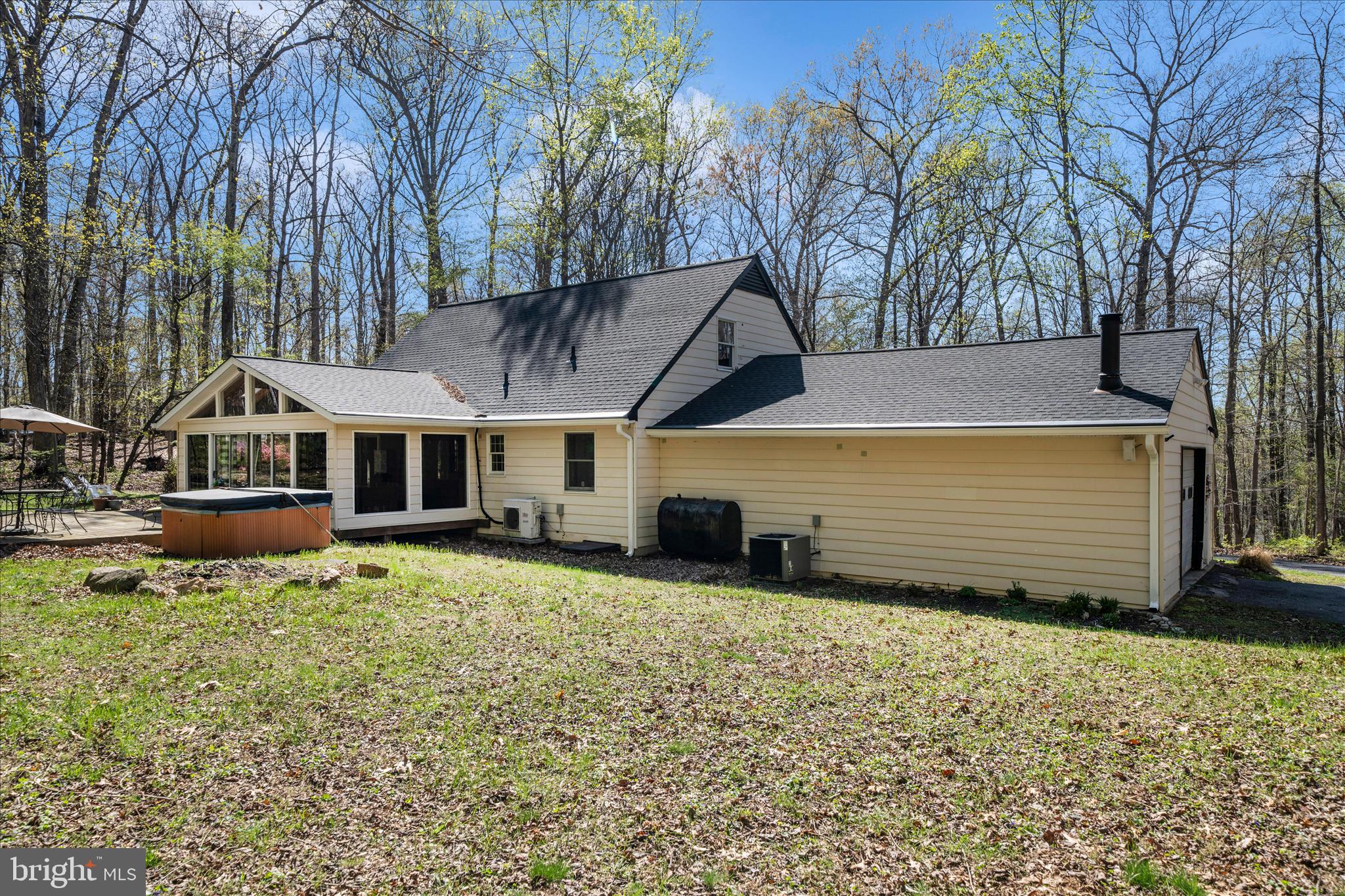 15211 Avery Road Rockville, MD 20855 - Photo 51 of 60 a view of a house with a yard