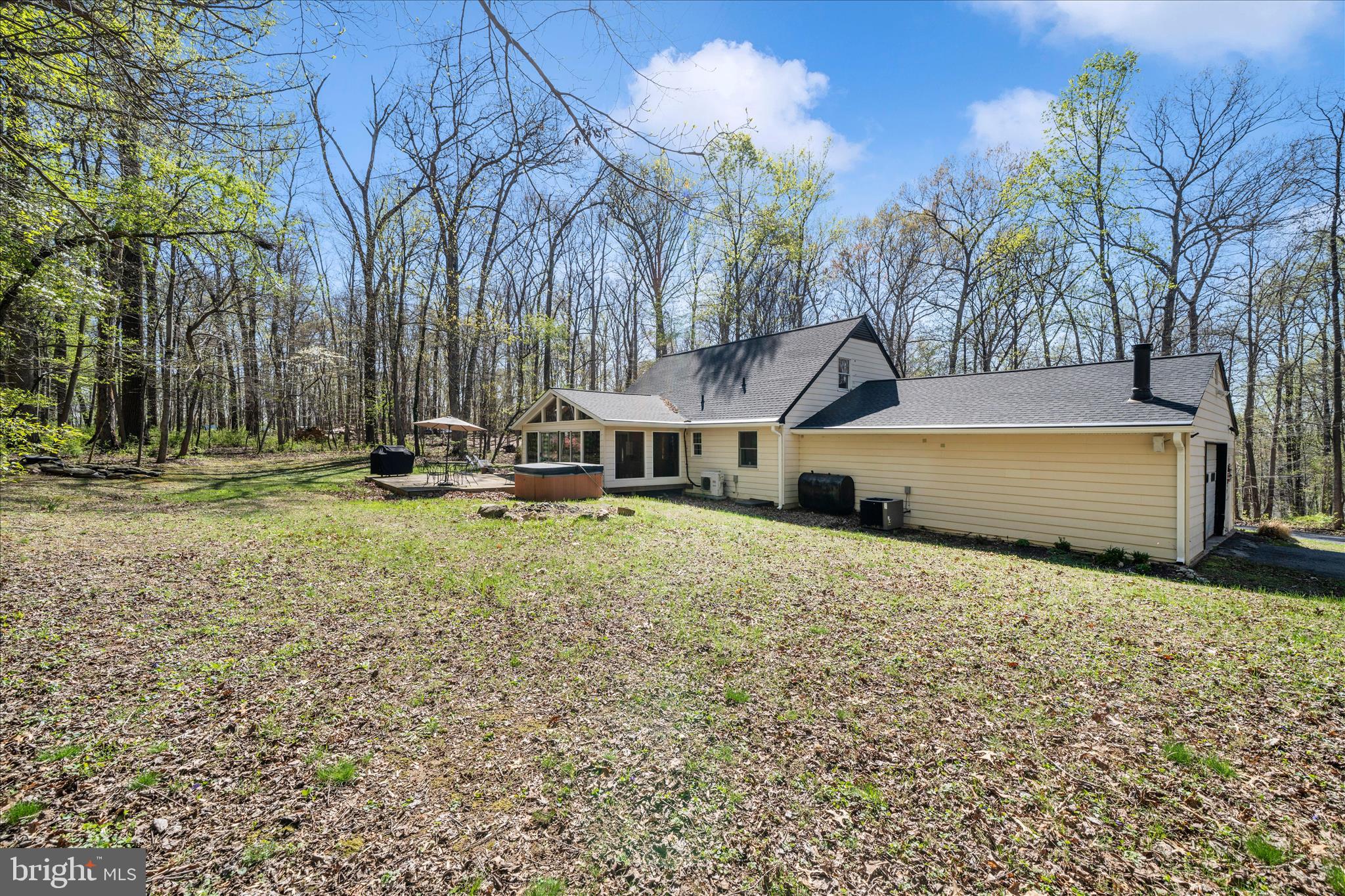 15211 Avery Road Rockville, MD 20855 - Photo 52 of 60 a front view of house with yard and trees