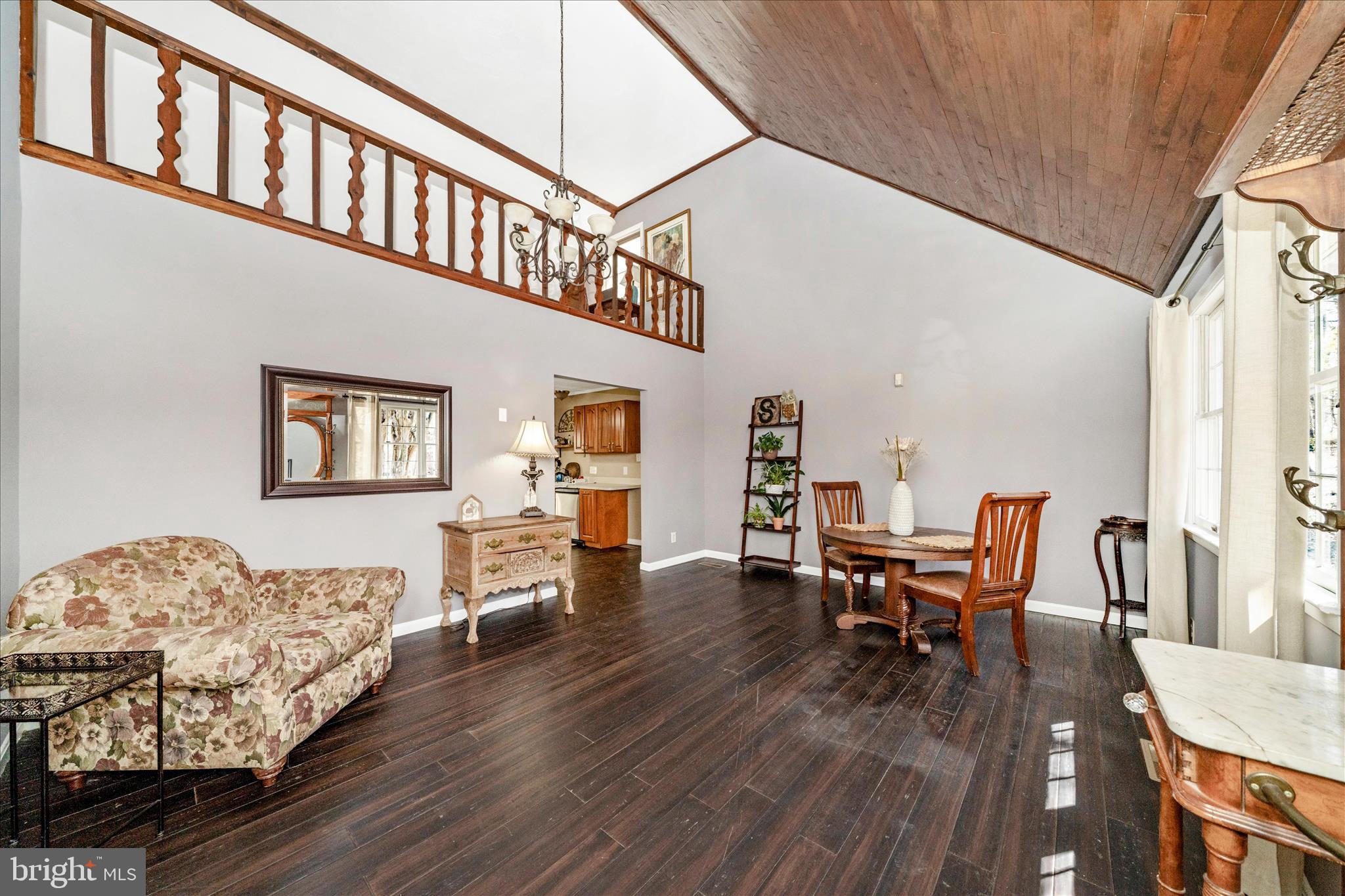15211 Avery Road Rockville, MD 20855 - Photo 7 of 60 a living room with furniture and a wooden floor
