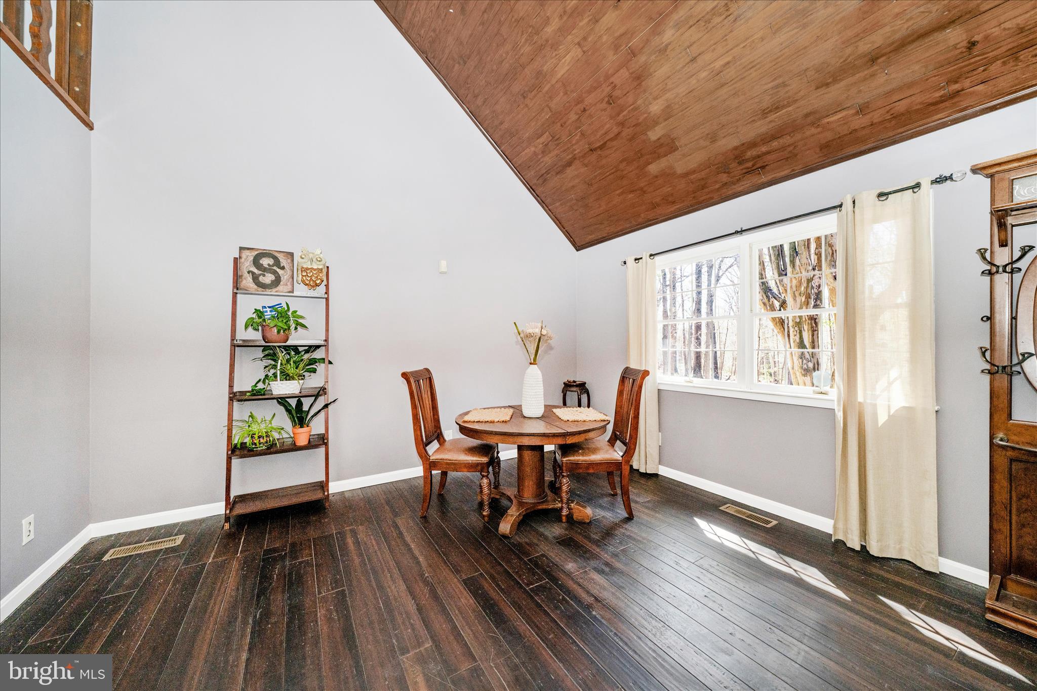 15211 Avery Road Rockville, MD 20855 - Photo 10 of 60 a dining room with furniture and wooden floor