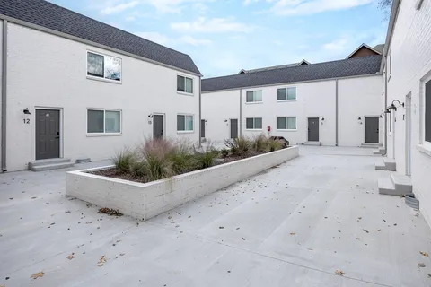 an entryway with two windows