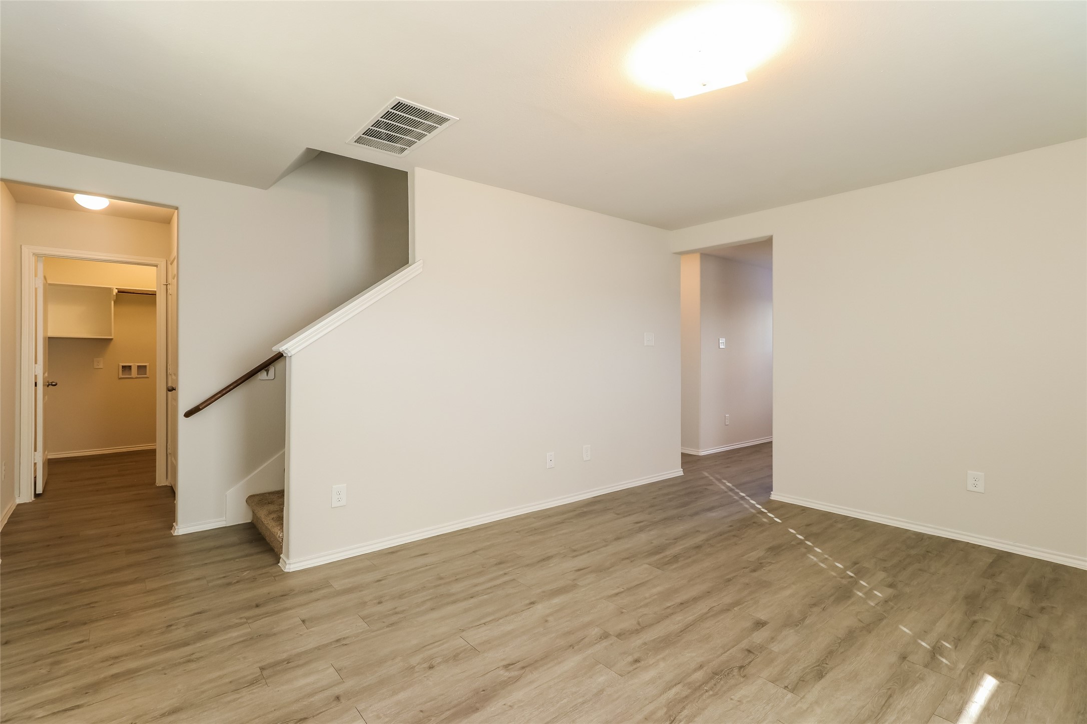 3229 Chunk Court Conroe, TX 77301 - Photo 5 of 18 wooden floor in an empty room