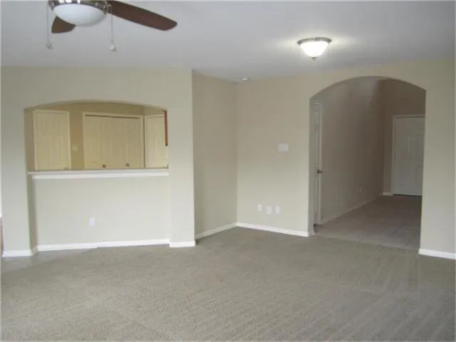 an empty room with a bathroom