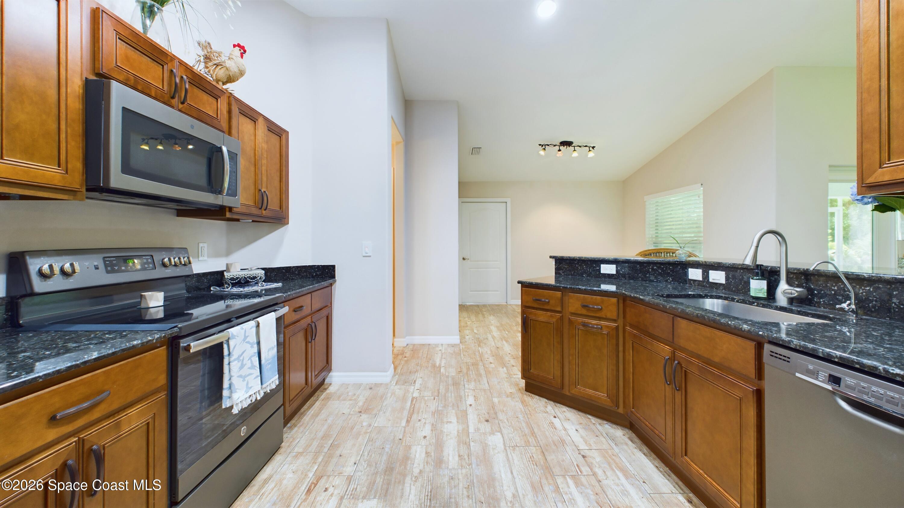 3995 Corey Road Grant-Valkaria, FL 32950 - Photo 9 of 43 CAM03755G0-PR0062-STILL043