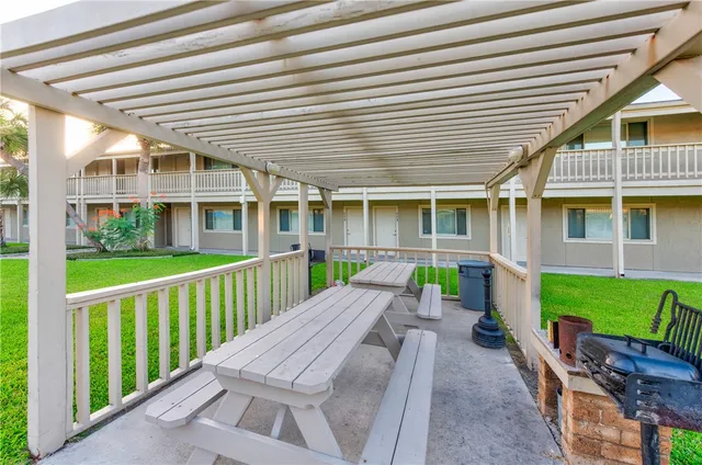 a front view of a house with a patio