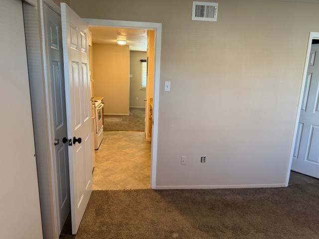622 Beach Access Road, Unit 228 Port Aransas, TX 78373 - Photo 4 of 12 an empty room with a door