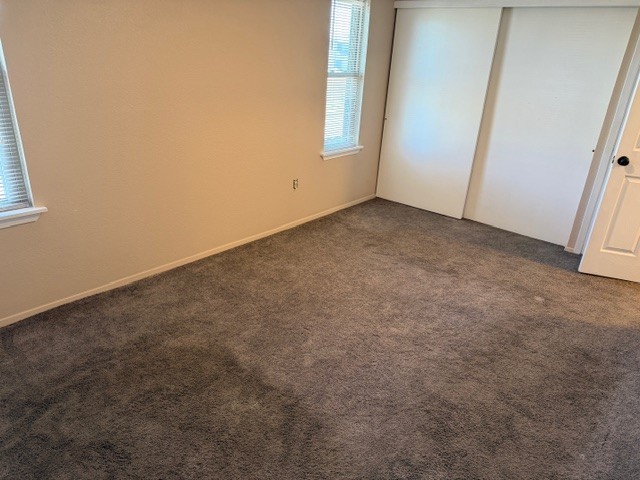 622 Beach Access Road, Unit 228 Port Aransas, TX 78373 - Photo 5 of 12 an empty room with windows
