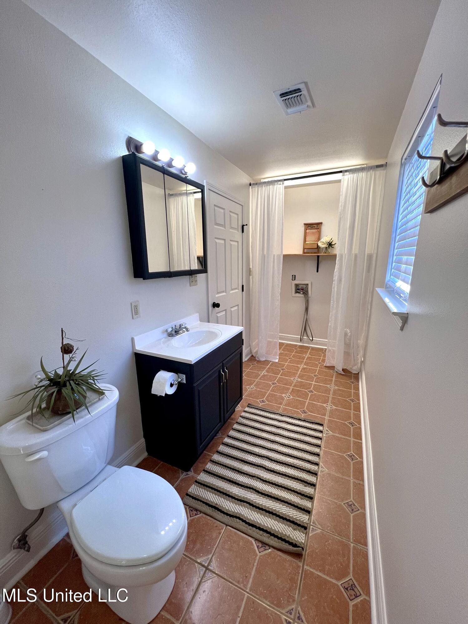 1185 Holden Road Poplarville, MS 39470 - Photo 14 of 21 Bath & Utility