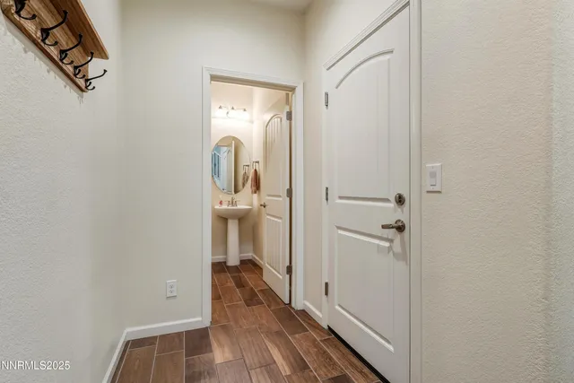 a view of a bathroom from a hallway