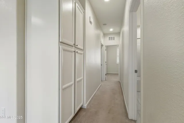 a view of a hallway with a elevator