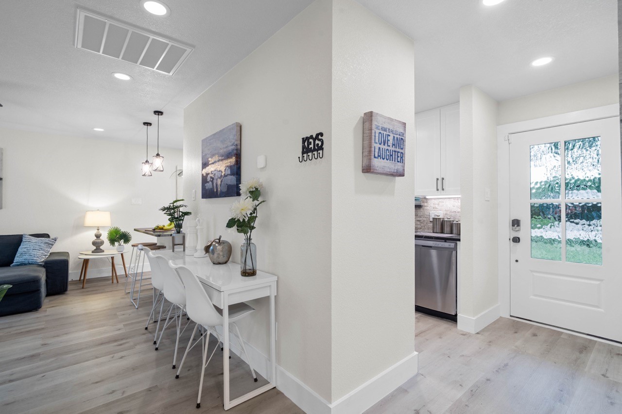 3138 Sunbeam Street Houston, TX 77051 - Photo 7 of 50 Clean architectural lines and an open-concept layout create seamless flow throughout this beautifully updated home built for modern living.
