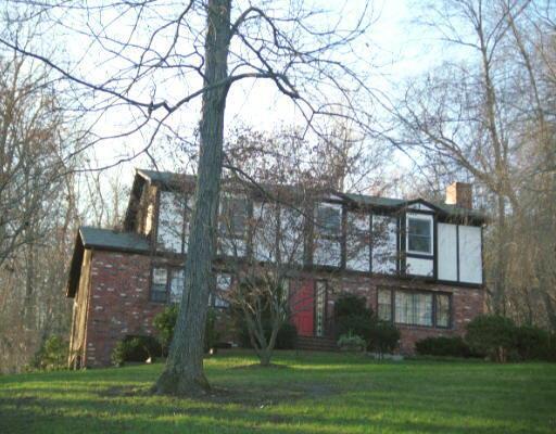 17 Wheeler Road Monroe, CT 06468 - Photo 1 of 1 a front view of a house with garden