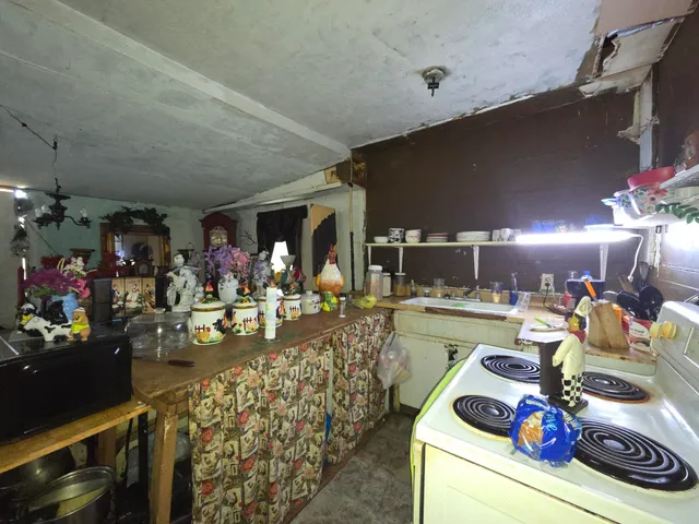 a living room filled with furniture and a table