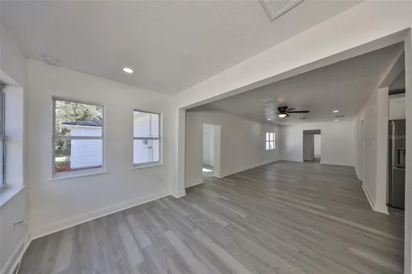a workspace with furniture and a window