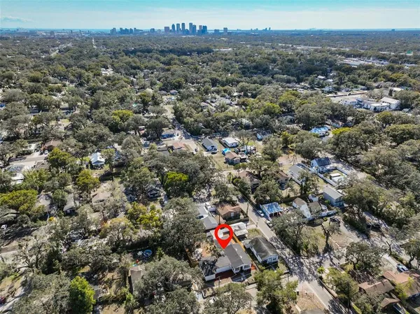 front view of a house with a trees