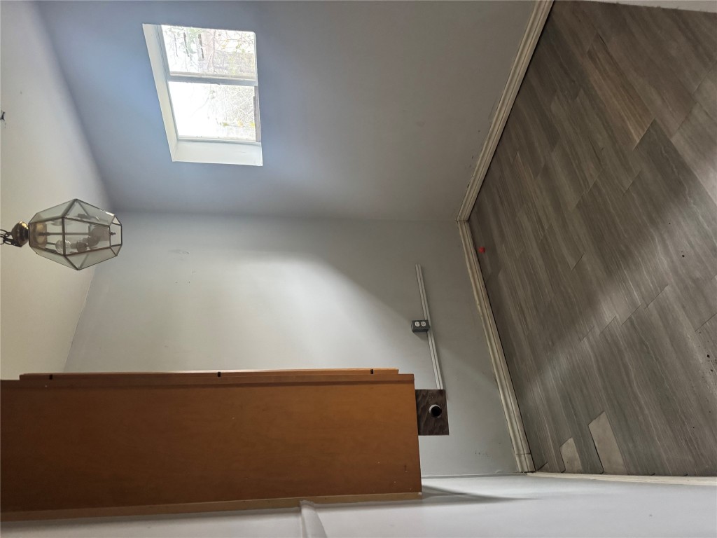 6304 Hudson Bend Road Austin, TX 78734 - Photo 9 of 9 Empty room featuring dark wood-style floors and baseboards