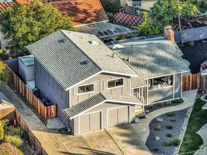 a aerial view of a house with a garden