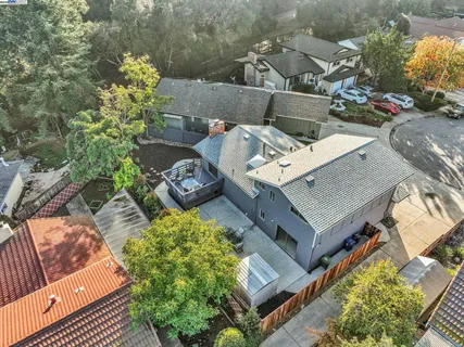 an aerial view of a house with a garden