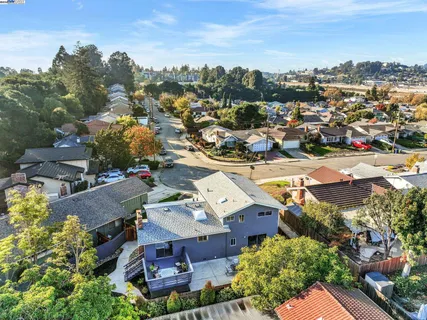 an aerial view of a city with lots of residential buildings