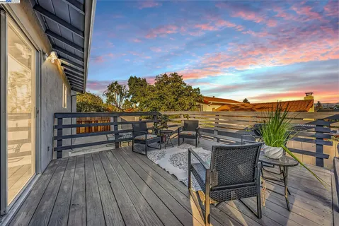 a view of roof deck with patio