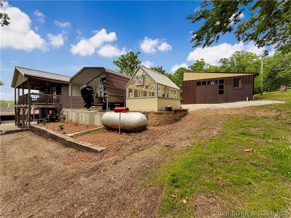 28251 Shore Road Warsaw, MO 65355 - Photo 6 of 51 Carport, Greenhouse, Storage/Man Cave