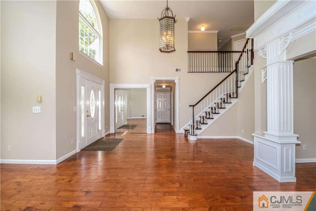 1 Daniel Road Edison, NJ 08820 - Photo 3 of 24 a view of an entryway with wooden floor