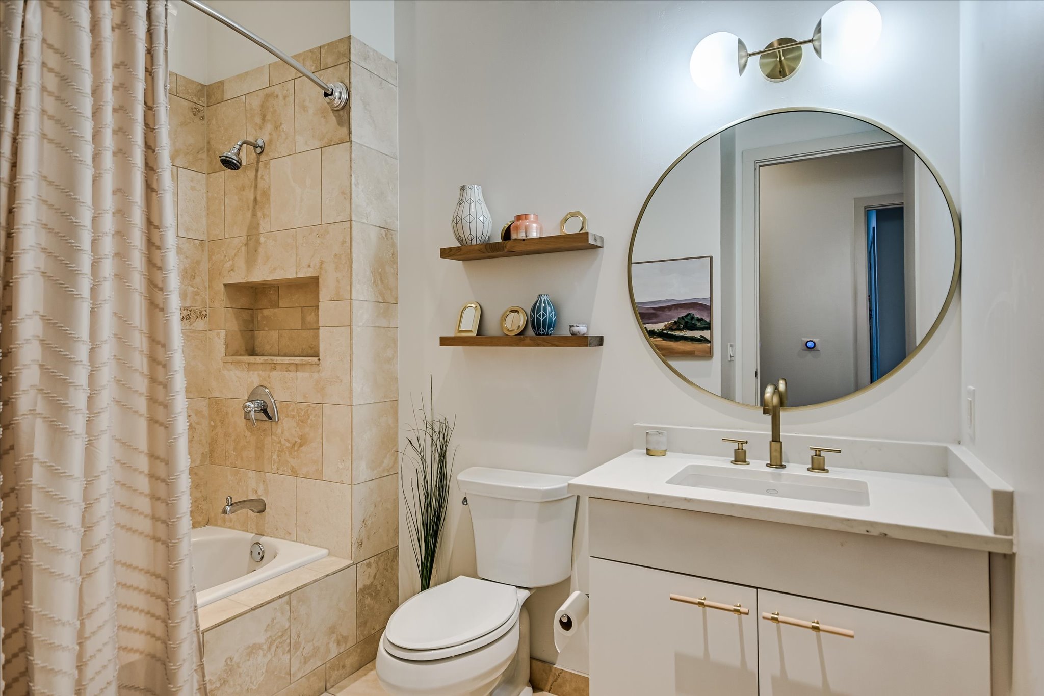 555 East 5th Street, Unit 2826 Austin, TX 78701 - Photo 20 of 40 a bathroom with a sink a toilet and shower