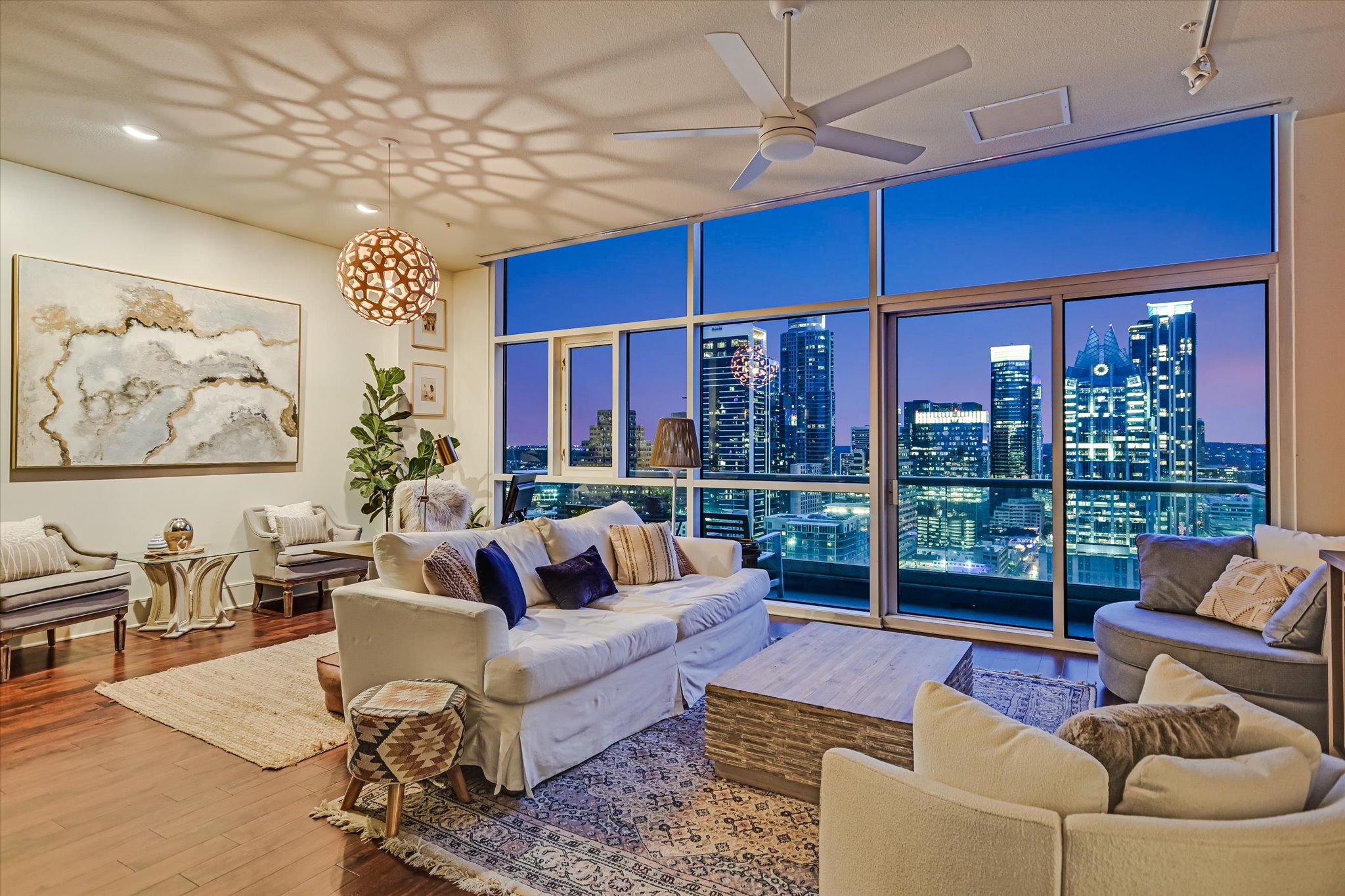 555 East 5th Street, Unit 2826 Austin, TX 78701 - Photo 2 of 40 a living room with furniture and a large window