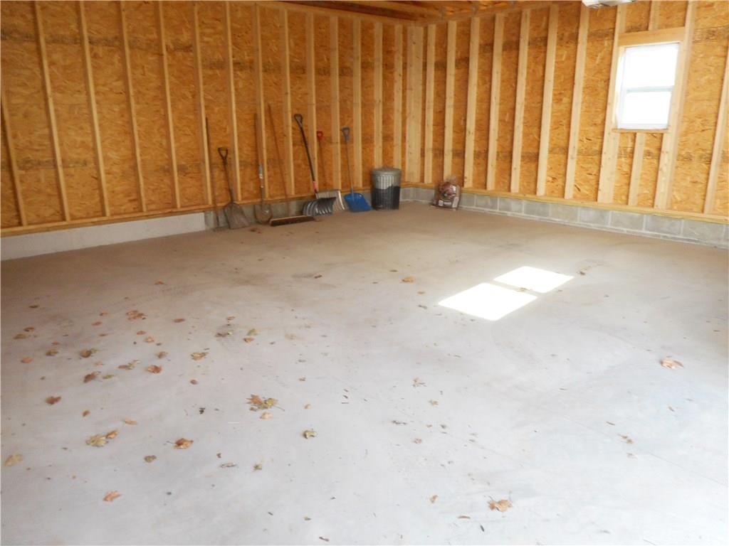 237 Rock Run Road Elizabeth, PA 15037 - Photo 22 of 25 3 Car Garage: No need to squeeze your cars in here. There is plenty of room.