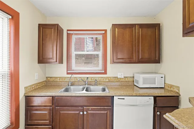 a bathroom with a sink and a cabinets