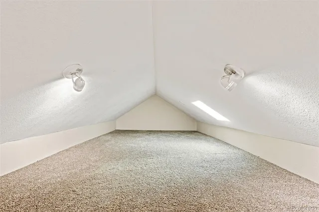 a view of a refrigerator in a room